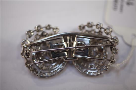 A 1930s/1940s platinum and diamond set double clip brooch, 2.25in.